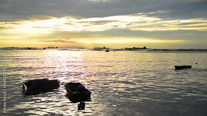 Vibrant sunset sky and sea in morning sunrise - dawn with landscape scenery on summer backgrounds. Golden sunny light natural phenomenon sunbeam outdoors with multi colored and no people