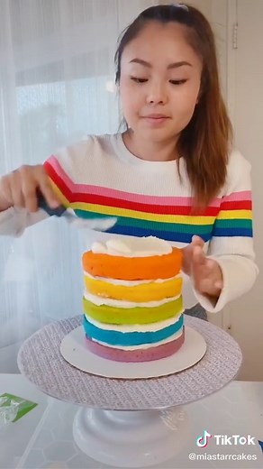 rainbow layer cake part 1: stacking #cake #cakedecorating #baking #fyp #rainbow #colors