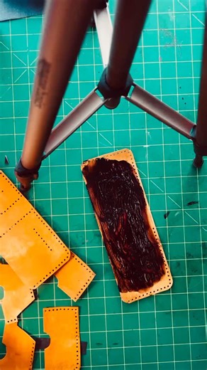 Wiping off the antiquing, is one of my favorite parts of the whole process. This leather wallet will be finished and listed today! Great Christmas gift for that fisherman in your life! 🎣🌲 | Found & Forever Leather