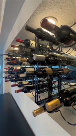 Creating the look of a custom built wine wall can be so easy. we had this little cut out with the mirror in my wine room, it looked great, but didn’t really have a purpose. So I found these wine racks on Amazon that you can custom make to whatever height you wish. This works great for odd areas like this , you can stack however, many you want to fill in the space. I’ve also use these wine racks in metal cabinets, shelves, counters, even inside kitchen cabinets by removing the doors and creating 