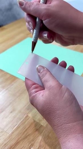 Uv resin and glitter make for a beautiful bookmark! I made this for my mom but these are a pretty quick easy make for anyone even yourself! #bookmarks #cricut #bookstagram #booklover #cricutideas #uvresin #resin #glitterresin #resinglitter #foilflakes #foiling #cricutdesignspace #cricutmade #cricutmaker #cricutinspo #giftideas | Corinne Blackstone