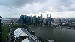 clip-1031653466-time-lapse-singapore-bay-day-sunset-night