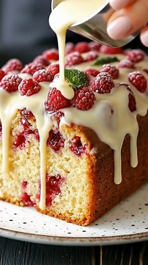 Raspberry Sauce Pound Cake with White Chocolate Drizzle — Don’t Lose This Recipe A warm loaf, rich with butter and vanilla, carries bright bursts of raspberry in every slice. While it cools, a soft sigh of steam rises and the kitchen smells like Sunday at Grandma’s—sweet, cozy, and a little fancy. Pour over a glossy white-chocolate drizzle, crown with fresh berries, and you’ve got a cake that feels like a hug at the table. Bake it for company, keep it for yourself. Don’t Lose This Recipe. Ingred