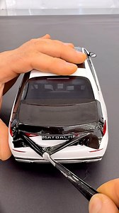 Two-Tone Maybach in Minutes (Tiny Edition) ✨🛠️ This Mercedes-Maybach S-Class comes factory two-tone (white/black), so we recreated the premium look by wrapping the roof in deep black while keeping the body clean white. Yes—this is a 1:18 scale model, but the technique is the same as a real car… you just need way less vinyl. Wrapped with Passion: no paint, no damage, fully reversible, and you can redo it until it’s factory-clean. ✅ Clean degrease the surface (silicone remover) 🧼 Detail the edge