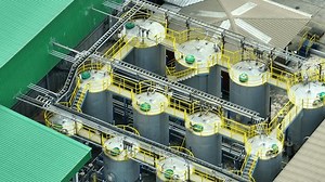 A lubricant plant is a facility that manufactures lubricating oils and greases. It blends and packages various lubricants for industrial and automotive applications. Technology and fluid concept. 4K.