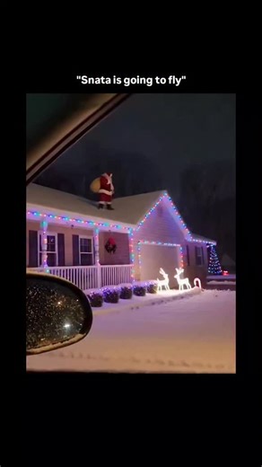 Knowledge | Curiosity | Discovery on Instagram: "The visual action captures an outdoor Christmas display, focusing on a large, inflatable Santa Claus figure positioned on a snowy residential rooftop, which then suddenly deflates and collapses into the snow bank below the eaves of the house. The content's psychological appeal derives from the unexpected humor and anti-climax of the holiday figure's sudden, dramatic failure, appealing to viewers' amusement regarding technical difficulties with lar