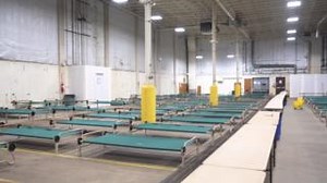 In Anchorage, a 150-bed shelter opened on October 31st in an unused municipal building. It was supposed to be the final piece of Anchorage's emergency cold weather shelter plan for this winter. But less than a month into the winter shelter season, there's a waitlist with about 1,000 people on it. Alaska Public Media's Jeremy Hsieh has this story. | Alaska Public Media