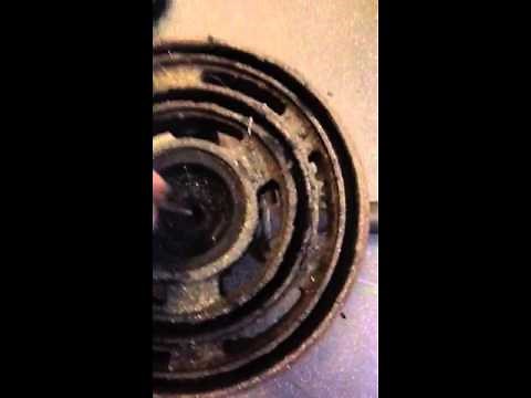 Servicing a vaporising or pot burner for an oil Aga