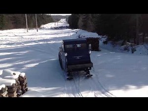 Snowmobile bombardier truck