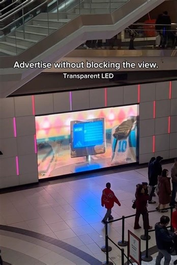 Posters cover your storefront. Transparent LED turns it into advertising without blocking the store.