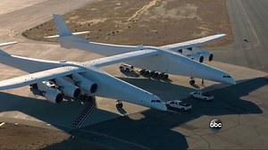 WORLD’S LARGEST PLANE: The twin-fuselage Stratolaunch, designed to launch rockets into space and with a wingspan longer than a football field, made its first taxi down a runway in Mojave, California. David Muirreports. http://abcn.ws/2oweXNk | ABC World News Tonight with David Muir