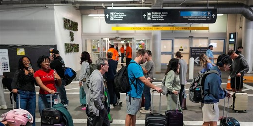 Long airport lines highlight concerns about unpaid security officers in the shutdown