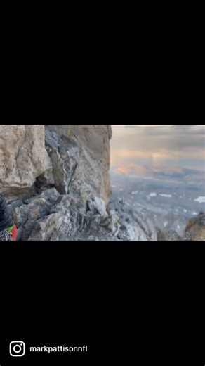 Going across the belly crawl section of the Grand Teton, in Jackson Hole. 3,000 feet straight down! #climbing #mountainlife #outdoors | Mark Pattison