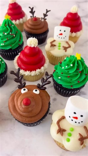 Lindsay Conchar on Instagram: "Christmas baking does not have to be complicated to be impressive. These easy Christmas cupcakes start with a simple, fluffy cupcake base and one batch of buttercream, then turn into four adorable holiday designs that anyone can make. You can decorate them as classic Santa hats, cute reindeer faces, festive Christmas trees, or melting snowmen, all using basic piping tips and simple decorations you likely already have. No advanced decorating skills required, just a 