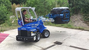 #MultiOne the mighty mini #loader. Our baby S520 shown here handling a very wet bale of silage with a bale grab attachment. #worksmarter | Multione UK