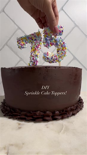 🥳 Sprinkle Cake Toppers! After years of seeing these cake toppers online I finally made some for my Dad’s 75th birthday cake! They were easy to make and are ideal for adding a personal touch to birthday cakes! Get the instructions below. 🎉Sprinkle Cake Toppers Ingredients: White or dark chocolate chips I used @enjoylifefood white mini chips Numbers printed out from a printer parchment paper Sprinkles I used @sweetapolita vegan sprinkles Squeeze bottle or a piping bag 2 stir sticks, lollipop st