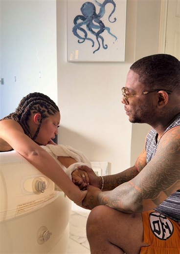 Inside the birthing pool, my contractions were rising like waves… stronger, closer, undeniable. And there he was—just outside the water, sitting on a stool, watching me. I could feel his anxiousness… not fear, but the kind of quiet tension a man carries when he loves something so deeply he would take the pain for her if he could. His eyes stayed on me—my breath, my body, my strength—like he was trying to hold me together with nothing but presence. I could almost hear his unspoken thoughts: Wait 