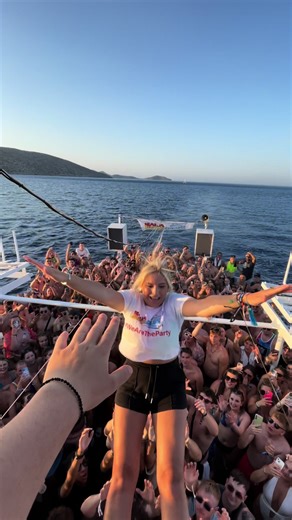 Crowd Surfing Fun at Malia Beach Boat Party