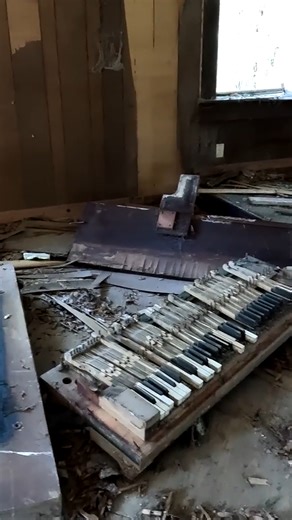 A sagging floor, a rotted piano, and daylight slipping through a broken roof, this old church is in its last moments. Every board and every beam tells the story of a place that once thrived… now quietly fading into history. Walking inside is risky, but what remains is a rare glimpse into the past before it disappears forever #standingbythreads #abandonedchurch #urbanexploration | Adventures Into History