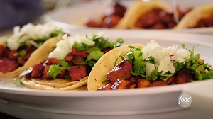 Can't stop thinking about these tender flavor-packed Al Pastor tacos from Andale Taqueria & Mercado! Just like Guy Fieri, we could go for about 12 right now 🌮🌮 #DDD, Fridays at 9|8c. | Food Network