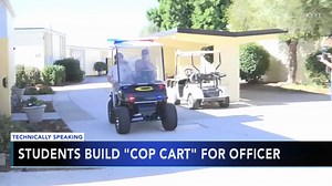 Students build mini cop car for school resource officer