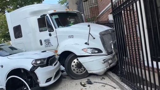 A truck smashed multiple vehicles and a building in the Bronx