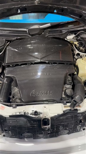 @cascade_garage on Instagram: "Check this out! We’ve been working on these dry carbon fiber engine components for MONTHS! It’s such a tedious process but the prototype is a point where it is almost done and ready for you guys! What do you think? Is this a cop for all M113 engines? #mercedes #carbonfiber #w202 #m113"
