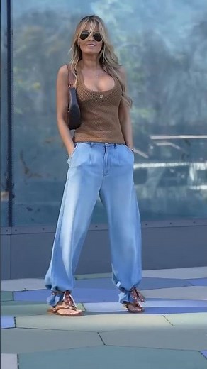 Oversized Light Blue Denim And A Brown Mesh Top: The Street Style Look Of The Season #streetstyle