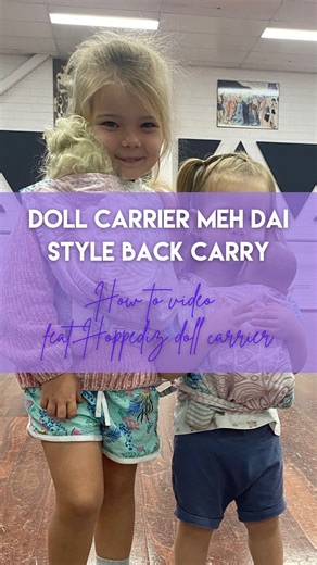 Babywearing educator and retailer on Instagram: "How to fit a Meh Dai style doll carrier in a back carry. Featuring the Hoppediz doll carrier in Jaipur Cream. For your matching mini me! Perfect for playing on the go but also having their baby close! 💜Velcro waistband to fit a wide range up ages and a sizes 💜Perfect for carrying dolls or soft toys 💜Cross straps for perfect fit 💜Front and back carrying options (see me previous front carrying video) 💜Comes in a variety of colours, brands and s