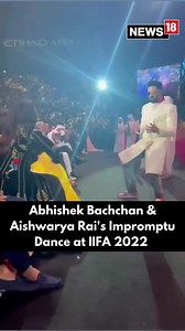 Aishwarya Rai Bachchan And Abhishek Bachchan delight audiences with an impromptu dance performance at #IIFA Awards 2022 in Abu Dhabi. 🎥 @iifa | News18