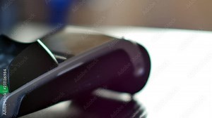 Contactless payment with smartphone with NFC technlogy. Paying with a smartphone device on a credit card POS terminal. Wireless payment.