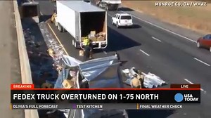FedEx truck overturns on highway, spills packages