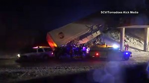 14K views · 130 reactions | While we're enjoying sunny weather, folks in Kansas are dealing with a blizzard! Strong winds blew this UPS tractor-trailer right over an interstate bridge last night. The driver managed to crawl out of the cab and is doing OK. More snow is on the way for them! | WSLS 10 / WSLS.com | Facebook