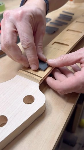 Ellis Hahn - Electric Bass Builder at L.E.H. Guitars on Instagram: "Installing jet black block inlays on this special custom order. The fit is pretty close from my cnc but I like to dial them in by hand to make sure they are perfect. 🤌 . . . TAGS: #5string #lehguitarsbass #bassmaker #bassporn #basslife #basslove #instabass #bassforward #lowend #notreble #bassgear #bassmaker #bassguitar #electricbass #custombass #bassist #bassgram #bassforward #boutiquebass #handmadebass #bassesofinstagram #bass