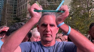 Meet the Antisemitic QAnon Leader Who Led Followers to Dallas to Meet JFK