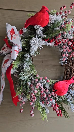 🎄✨ Winter Cardinal Wreath – Perfect for Your Front Door! ✨🎄 Cardinals are said to be a reminder that loved ones are near… and this wreath brings that comfort and Christmas cheer in the most beautiful way. ❤️🕊️ This handcrafted design features: 🔹 Two vibrant red cardinals 🔹 Frosted evergreens & icy eucalyptus 🔹 Snow-kissed berries & wintry florals 🔹 A festive bow with cardinal print ribbon 🔹 Built on a natural grapevine base for that classic farmhouse charm 🎁 A gorgeous statement for you
