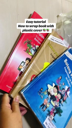Easy Tutorial: How to Wrap Books with Plastic Cover