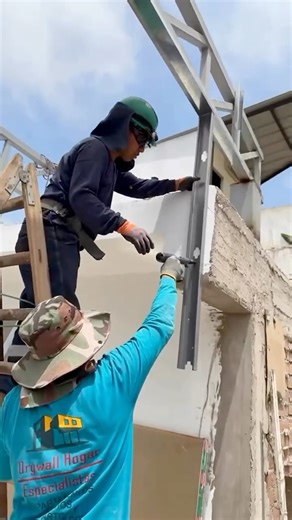 Drywall gun with nails and drywall primers