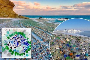 Waves transform Russian beach from dumping ground for alcohol bottles into colourful pebble beach