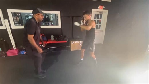 Snowell Boxing Clinic Aaron Snowell hall of fame trainer of champions stood in the gym, watching his fighter, Joshua, go through a rigorous resistance training session with 2-pound weights. "Good job, Joshua, Keep those hands up and your core tight!" Aaron called out, his voice echoing through the gym. As Joshua finished his set, Aaron nodded in approval. "You know, Joshua, using light weights like these can be deceptively challenging. It's not just about brute strength; it's about speed, agilit