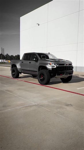 This is what a 2025 Chevy Silverado High Country JACKAL sounds like 🔊 Parts list: Supercharger @whipplesuperchargers ZR2 hood ZR2 grille (painted) ZR2 bumper ZR2 skid plate JACKAL body kit 3.0 coilovers @fox Control arms @mazzullaoffroad Leaf springs @deaver_suspension_inc Wheels @fueloffroad Tires @nittotire Bolt-in fender liners Brake kit @brembo Powersteps @realtruck Exhaust @corsaperformance #paxpower #chevy #silverado #zr2 #jackal | PaxPower Performance Trucks