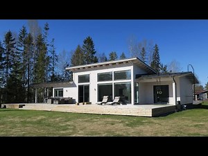 Kontio kylässä: Aurinkometsä -hirsitalo