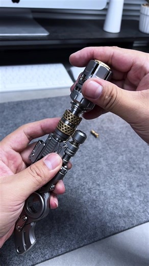 Titanium alloy revolver fidget toy!
