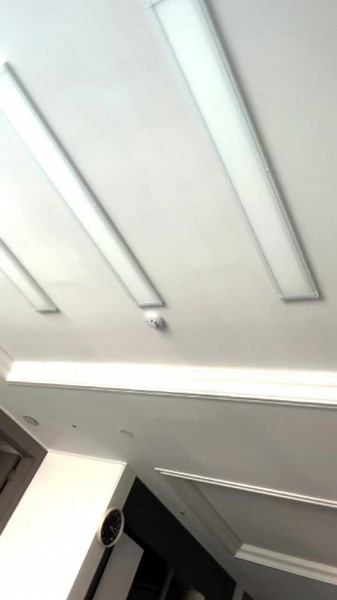 Modern Ceiling Design with Unique Light Fixtures