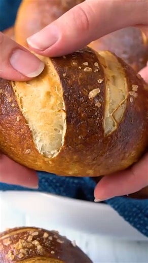 20K views · 317 reactions | Homemade pretzel rolls are soft, chewy, and golden brown with that signature salty crust. They’re perfect for sliders, dipping in soup, or eating warm with a smear of butter. Once you make them from scratch, there’s no going back. https://thestayathomechef.com/homemade-pretzel-rolls/ | The Stay At Home Chef | Facebook