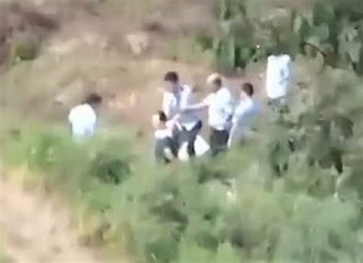 true story's uncovered on Instagram: "Horr!fic video shows the moment a man is k!lled during bru---tal Chinese public execution Large crowd of onlookers watch as man is removed from police van. He is then taken into clearing and shown to the crowd. Man is made to kneel before police officer places a gun at the back of his head. After shooting him, the man's body is photographed by police These pictures show the horrifying moment a man is publicly executed in China. The placard-wearing man can be