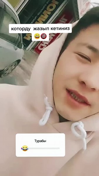 Lighthearted Moment: Person in Pink Hoodie Outside