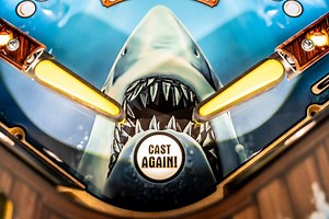 New JAWS Pinball Machine from Stern Has Original Movie Footage, Shark Toys, and Lots of Blood