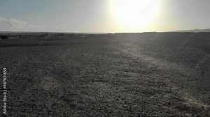 Arid desert soil with bright sun Drone footage from Negev desert, israel,2024