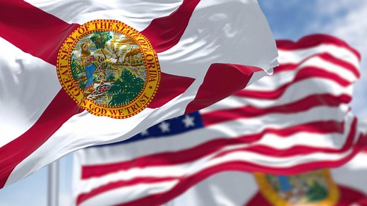 Why are flags flying at half-staff in Florida this week?